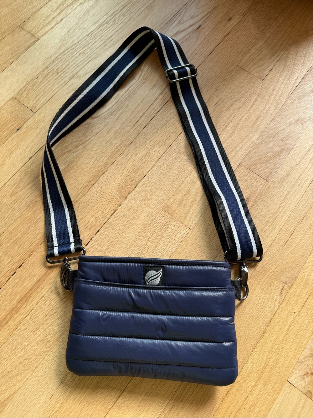 THINK ROYLN Navy Quilted Crossbody with Striped Strap